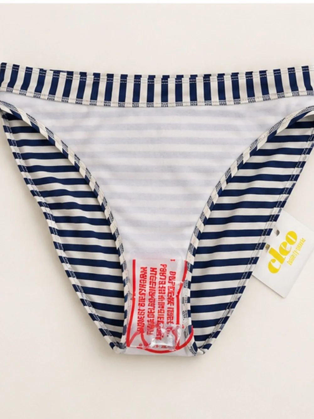 cleo beige bikini top with yellow trim